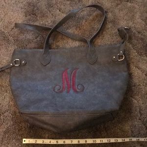 Purse with ‘M’ monogram